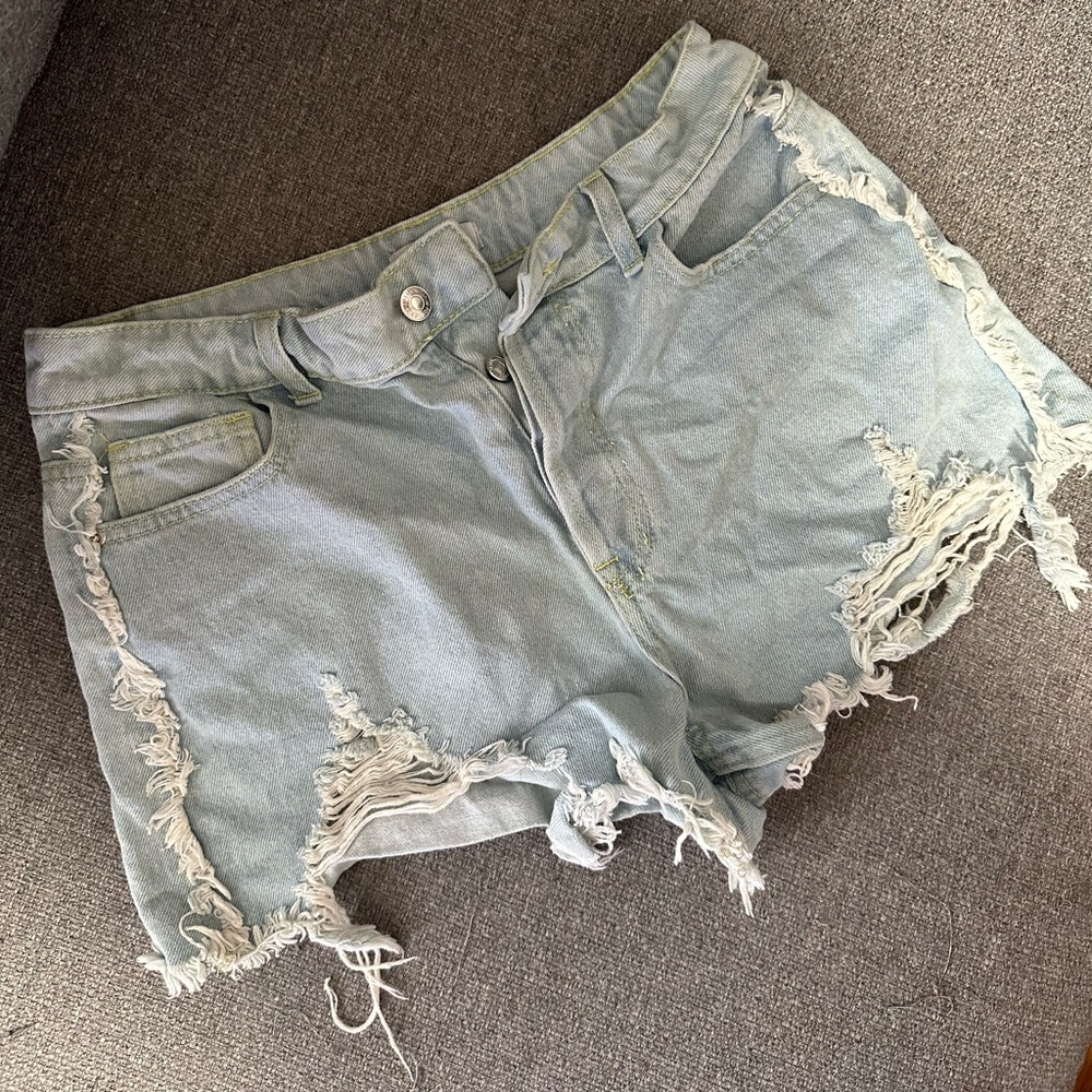 Light Denim Ripped Shorts • size 28